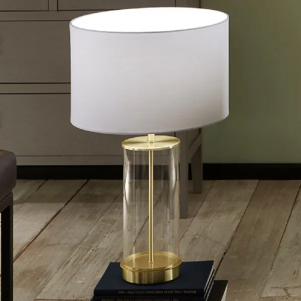 Clear Glass and Champagne Metal Table Lamp Ivory Shade